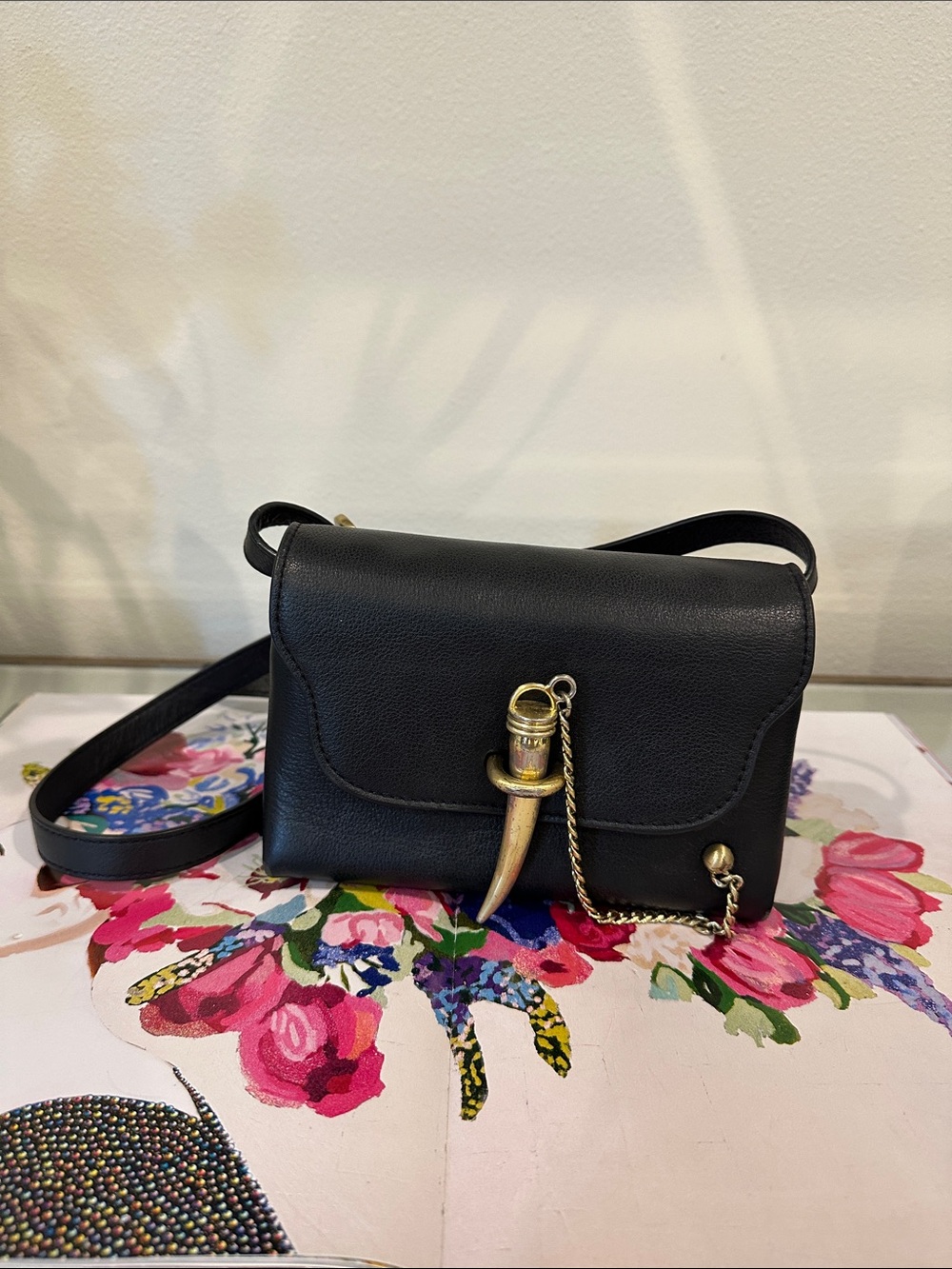 SANCIA Black Leather Crossbody Bag with Brass Horn Charm